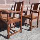 Pair of oak armchairs with straw seats and backs.