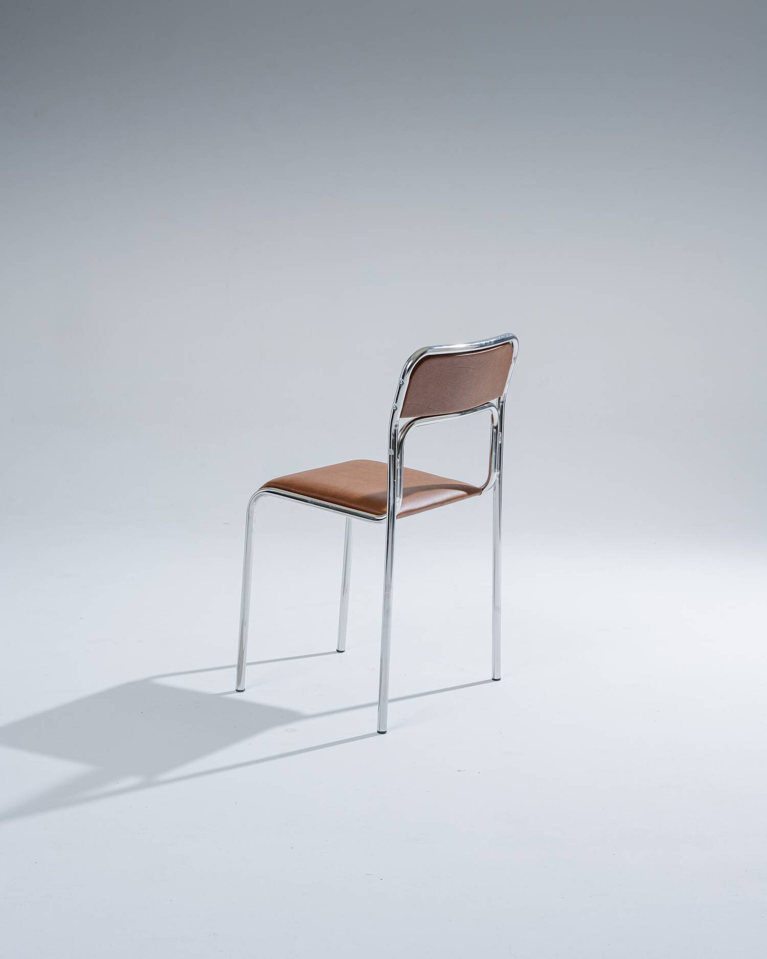 Tubular steel and cognac leatherette chair, 1980s