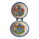 Pair of antique plates in popular earthenware with a floral basket decoration on the edge.