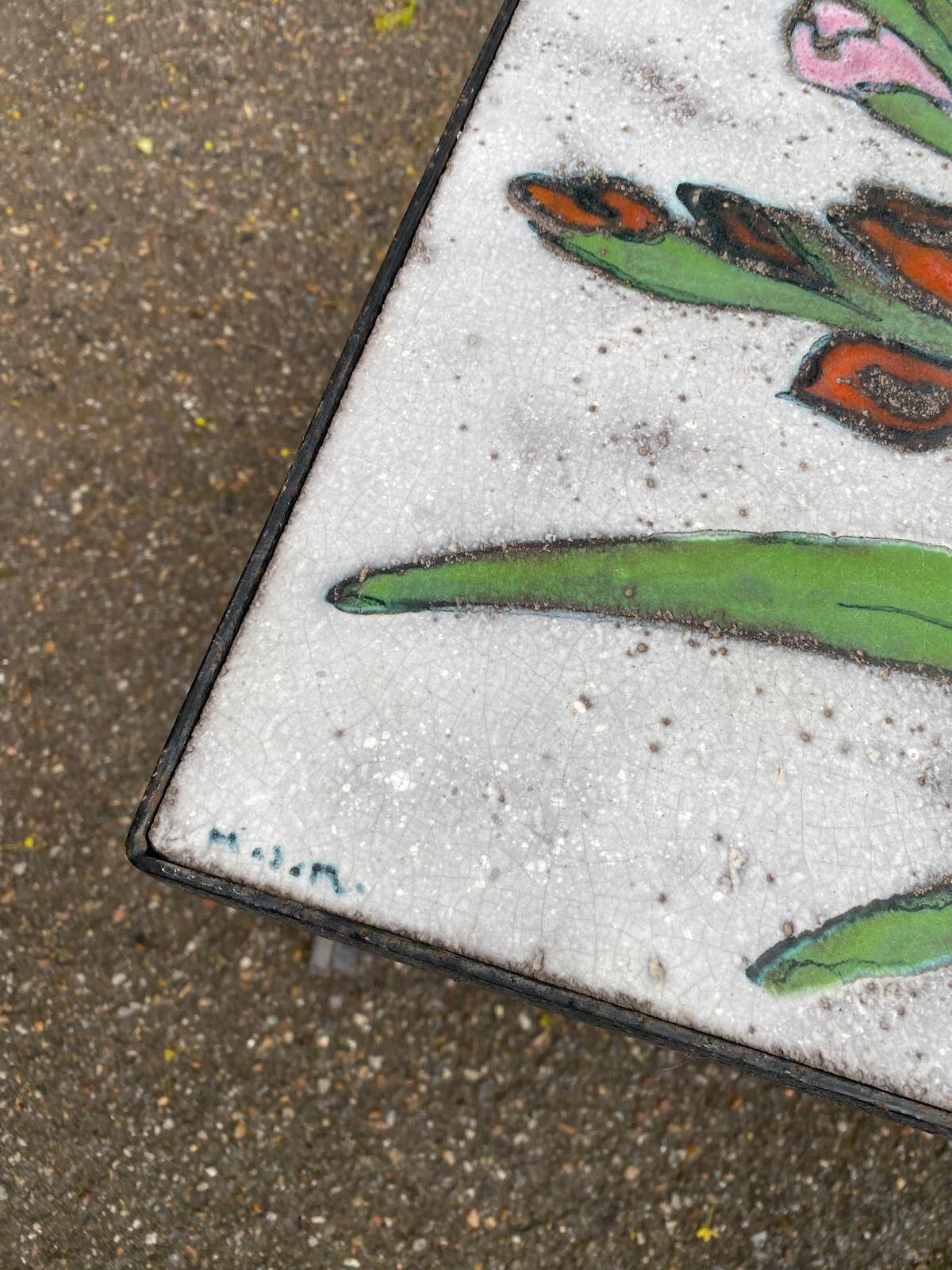 Vintage rectangular coffee table with ceramic inlaid flowers and steel.