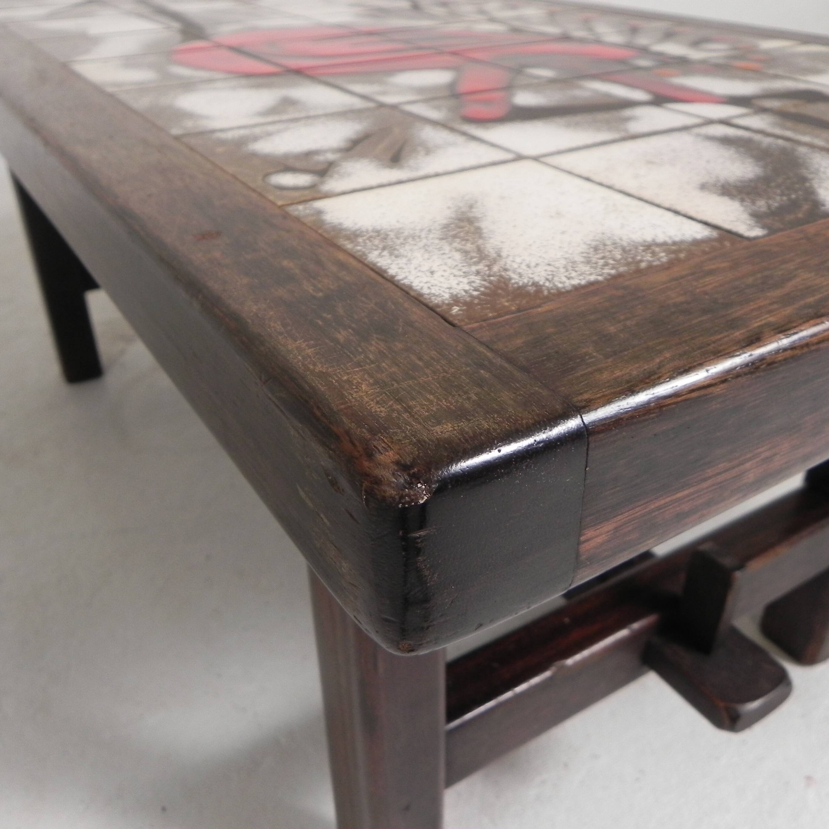 Square tile table from Vallauris, signed Dan with an image of a fantastic bird, 1960s.