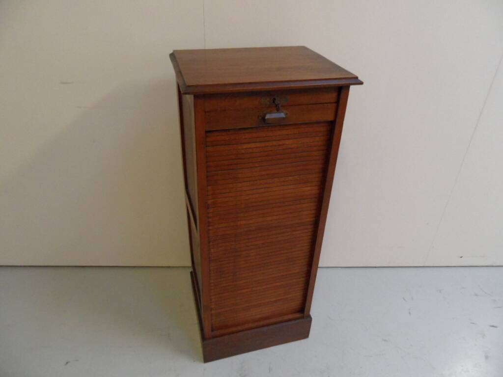 Antique filing cabinet with roller shutter