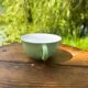 Set of 5 mismatched vintage pastel-coloured cups.