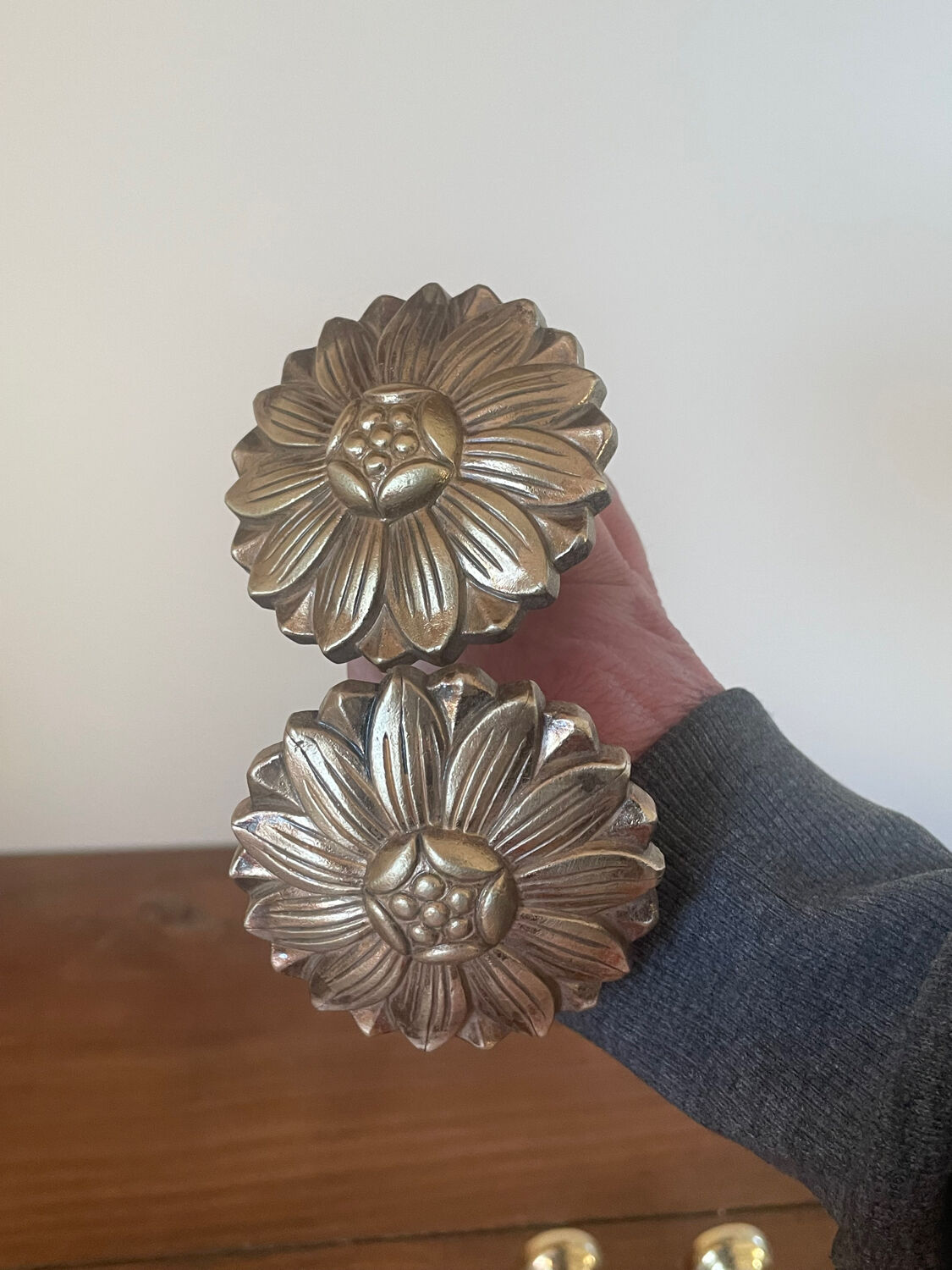 2 golden brass hooks with flower curtain tiebacks