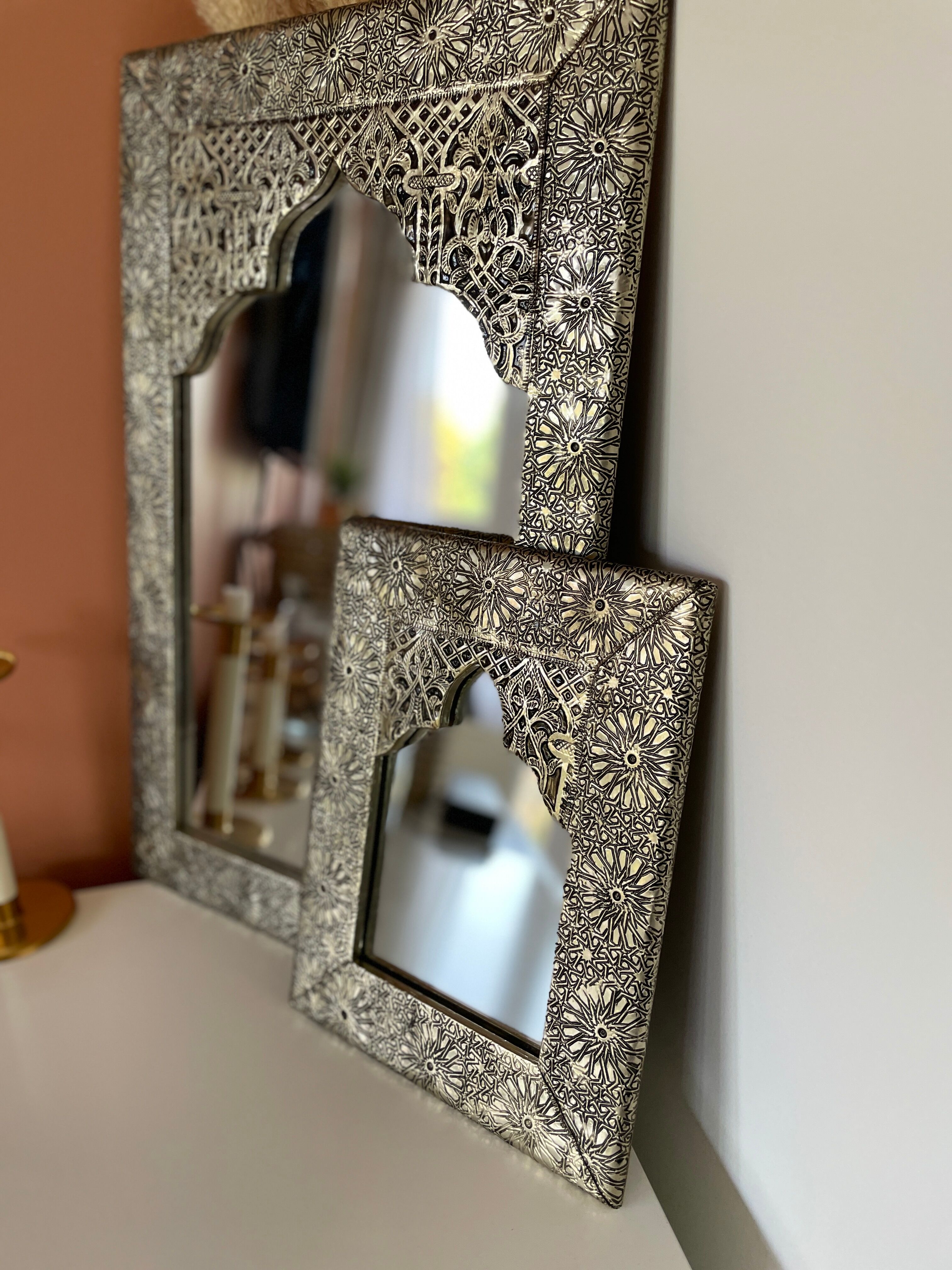 Silver oriental mirror