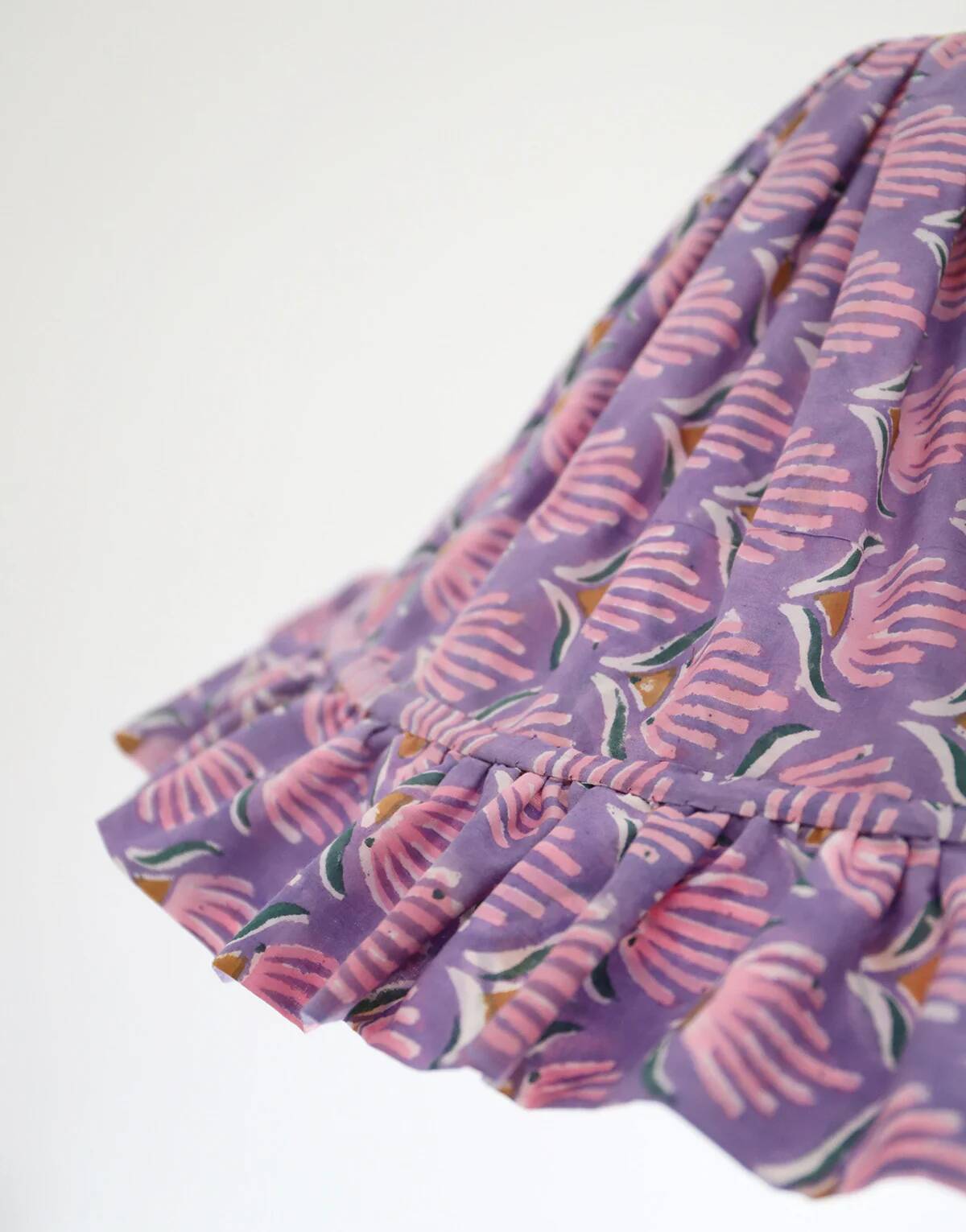 Emilia "purple shell flowers" conical textile suspension with flounce