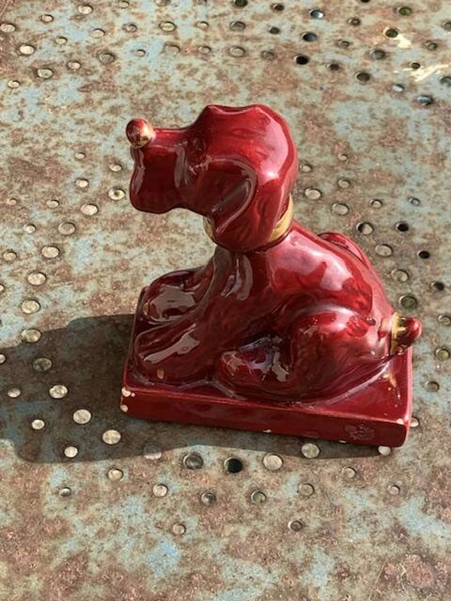 Dog sign CAB in vintage burgundy red enameled ceramic slip, art deco