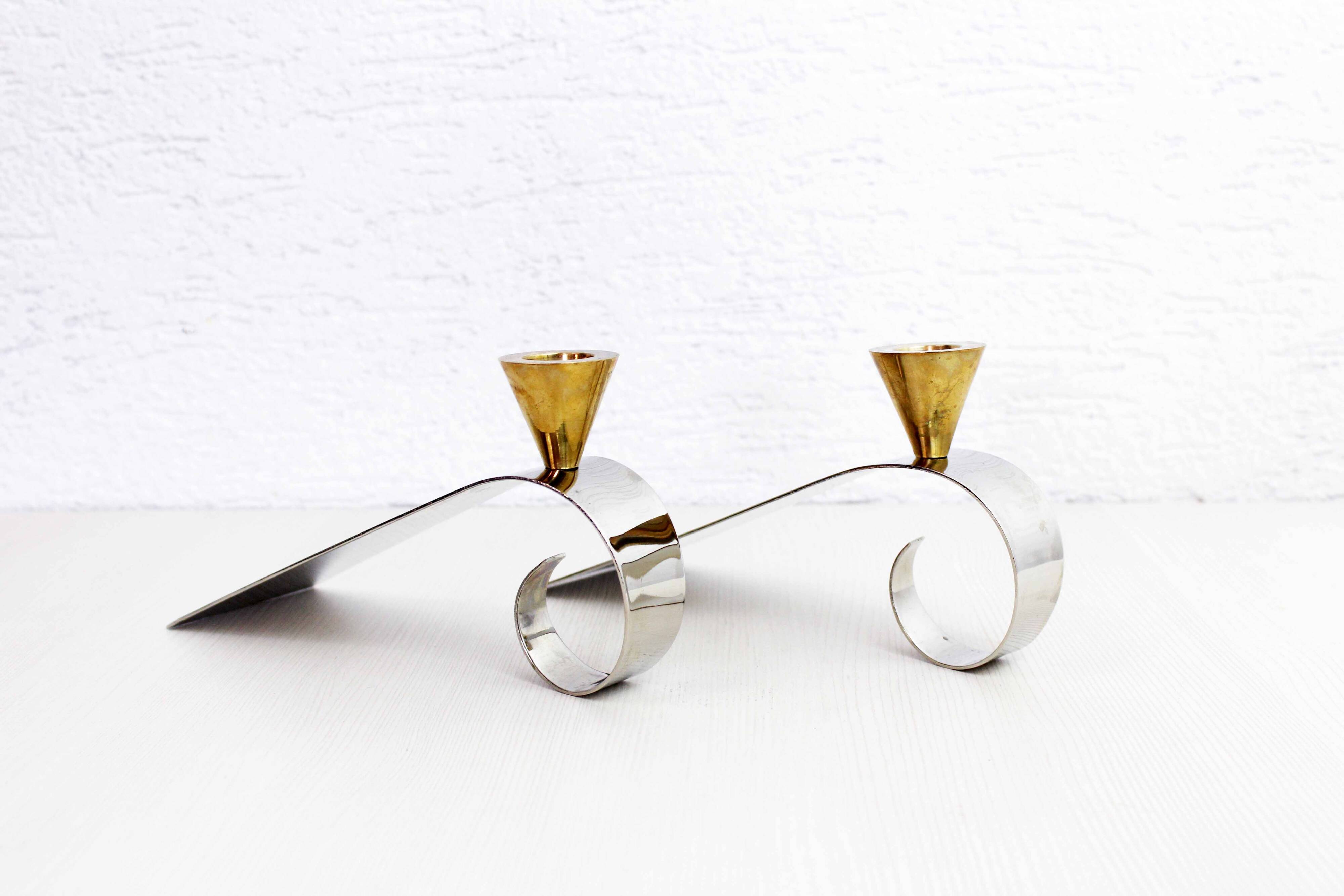 Pair of brass and chrome-plated metal candlesticks