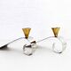 Pair of brass and chrome-plated metal candlesticks