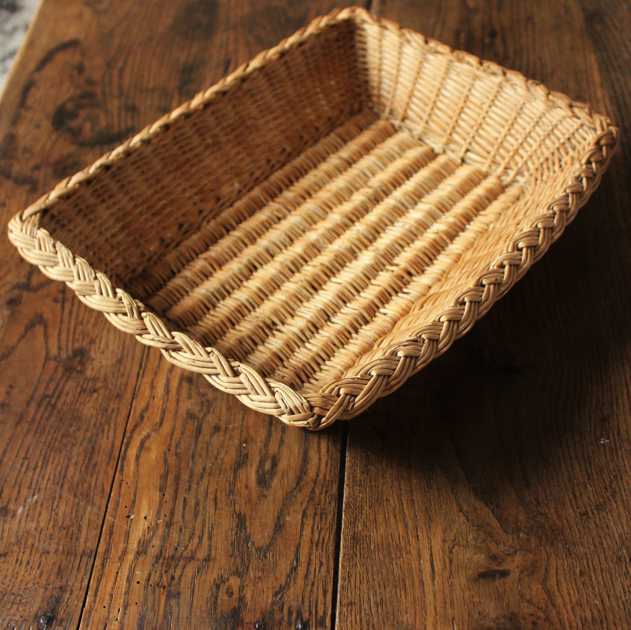 Braided wicker basket basket