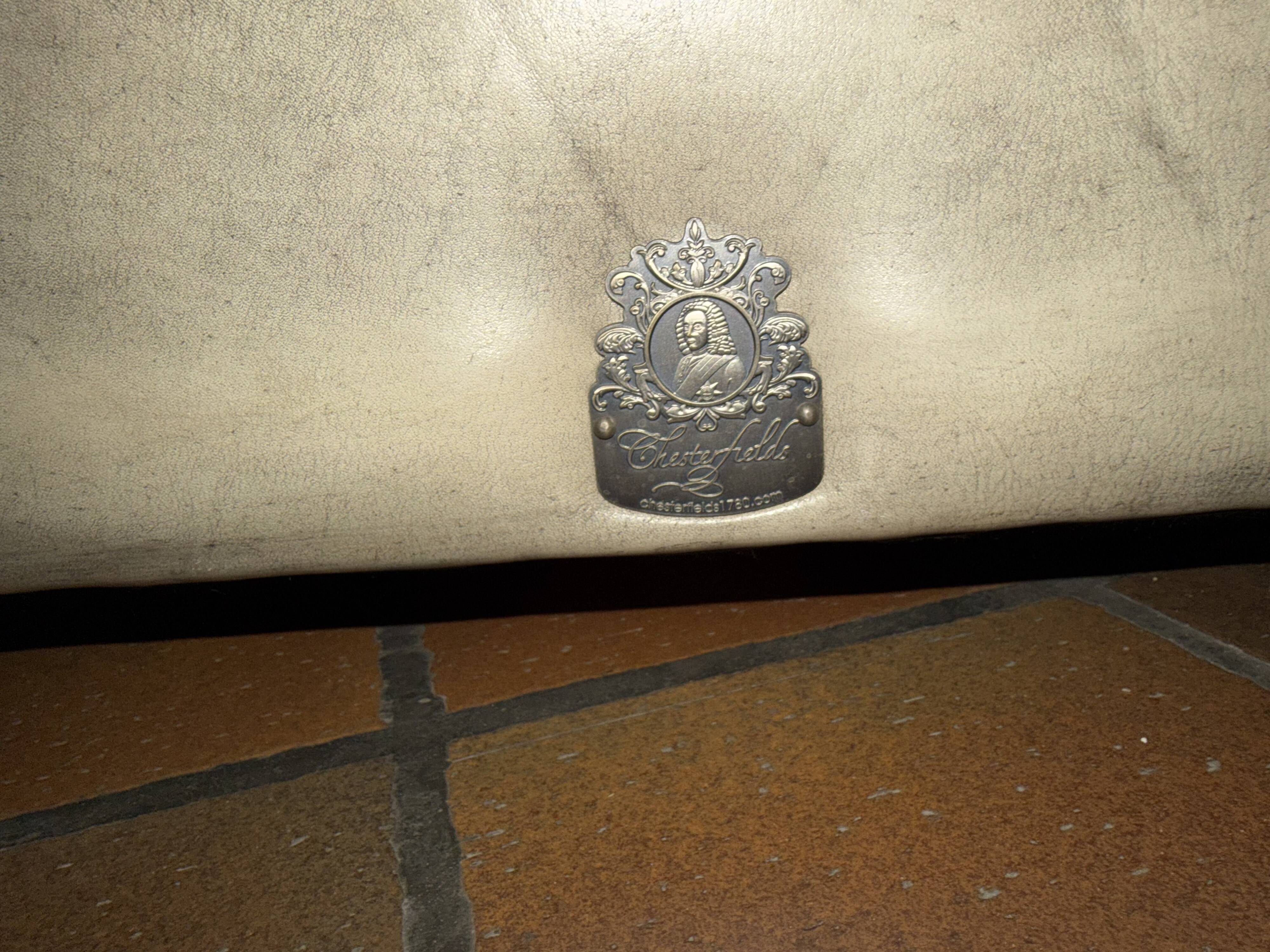Three-seater Chesterfield canapé in patinated leather, custom-made by Chesterfields1780.