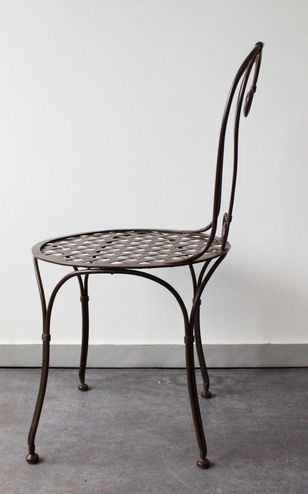 Set of 4 wrought iron chairs.