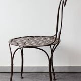 Set of 4 wrought iron chairs.