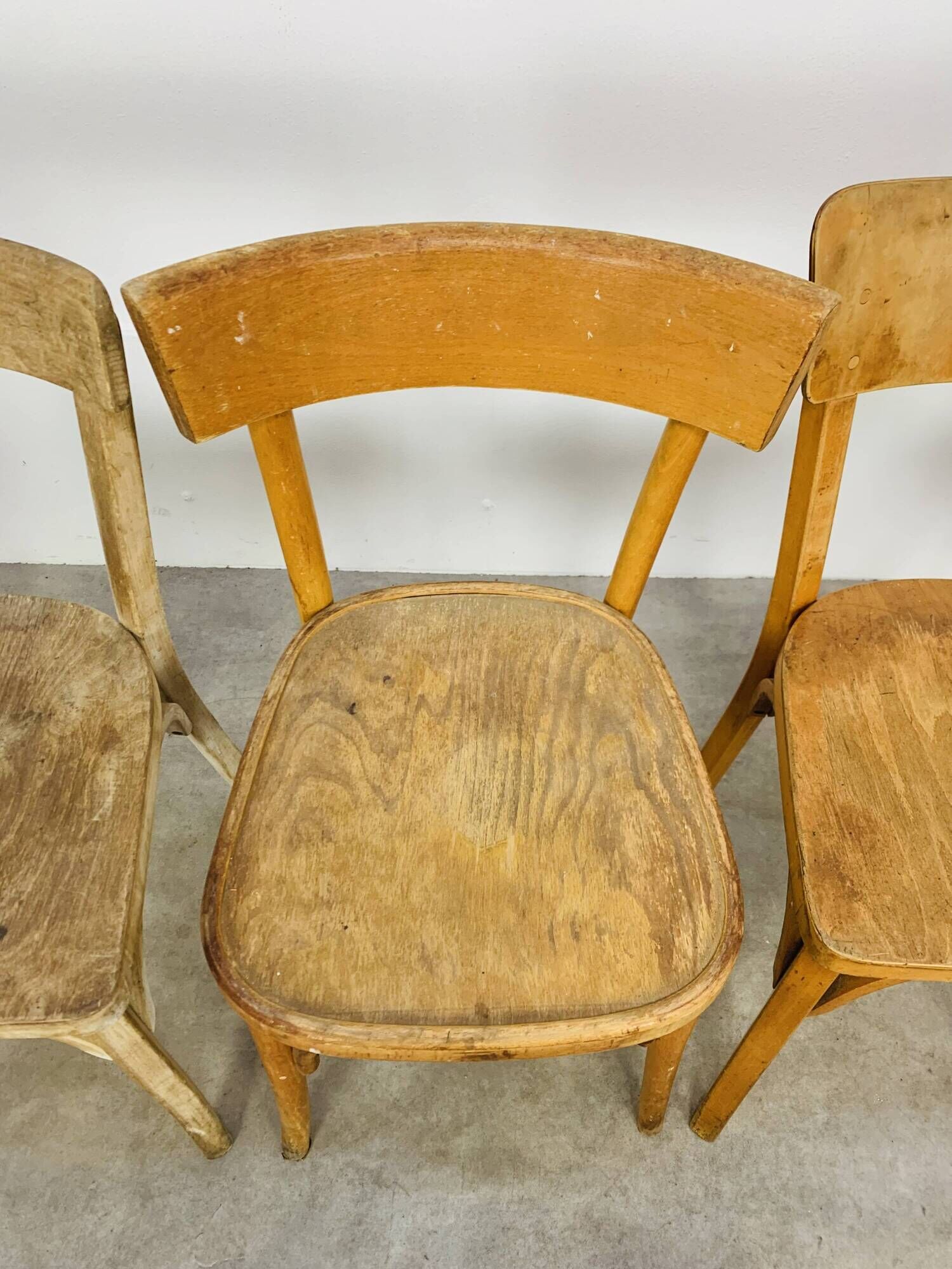 6 mismatched Baumann & Luterma bistro chairs, wood, 1960s