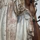 Garden statue of the Virgin Mary in old reconstituted stone