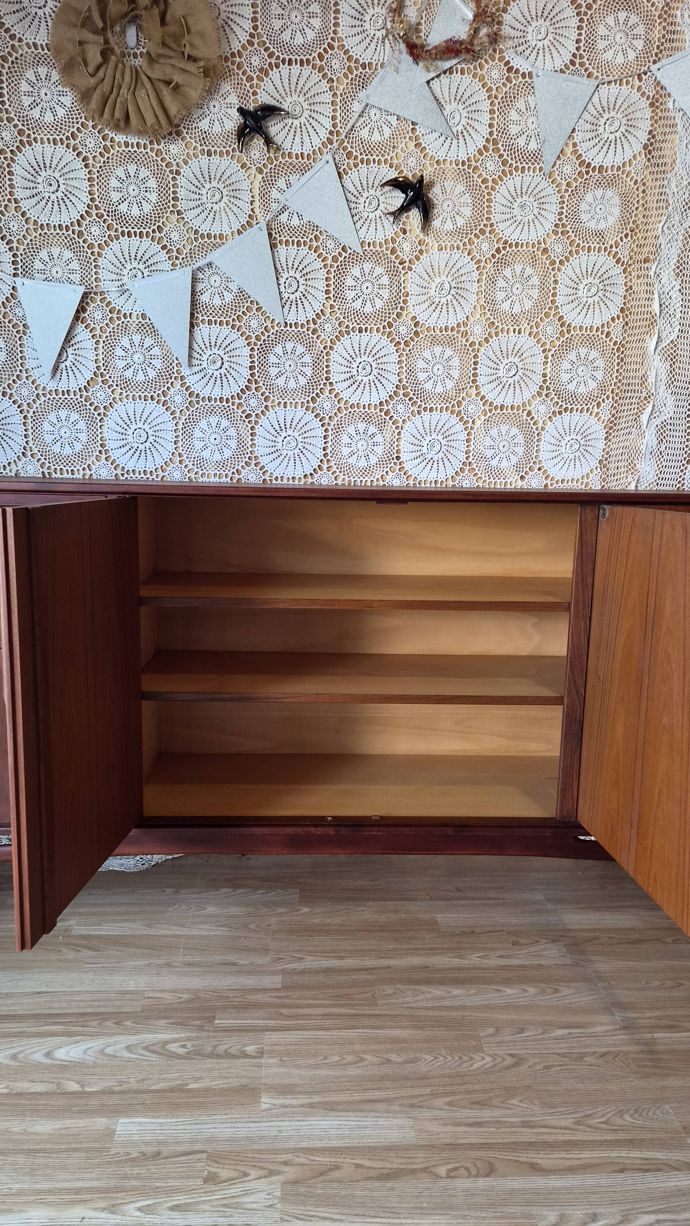 Scandinavian threading Swiss teak model 6002 dated 1961.