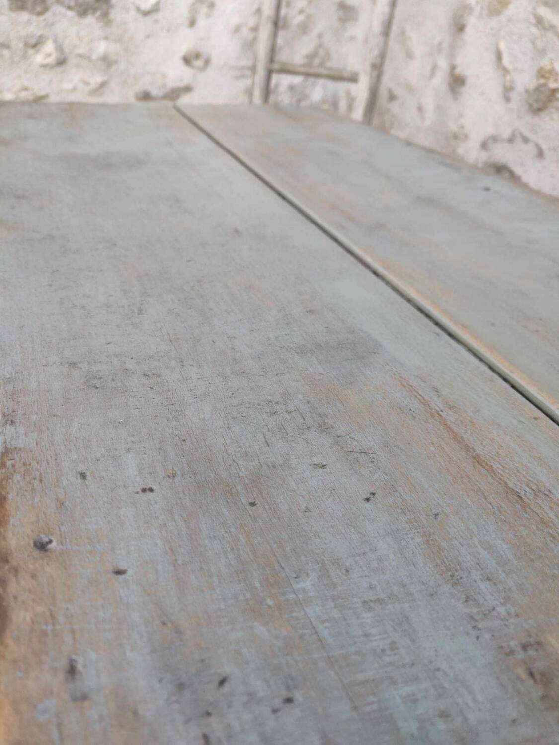 Patinated coffee table with a drawer