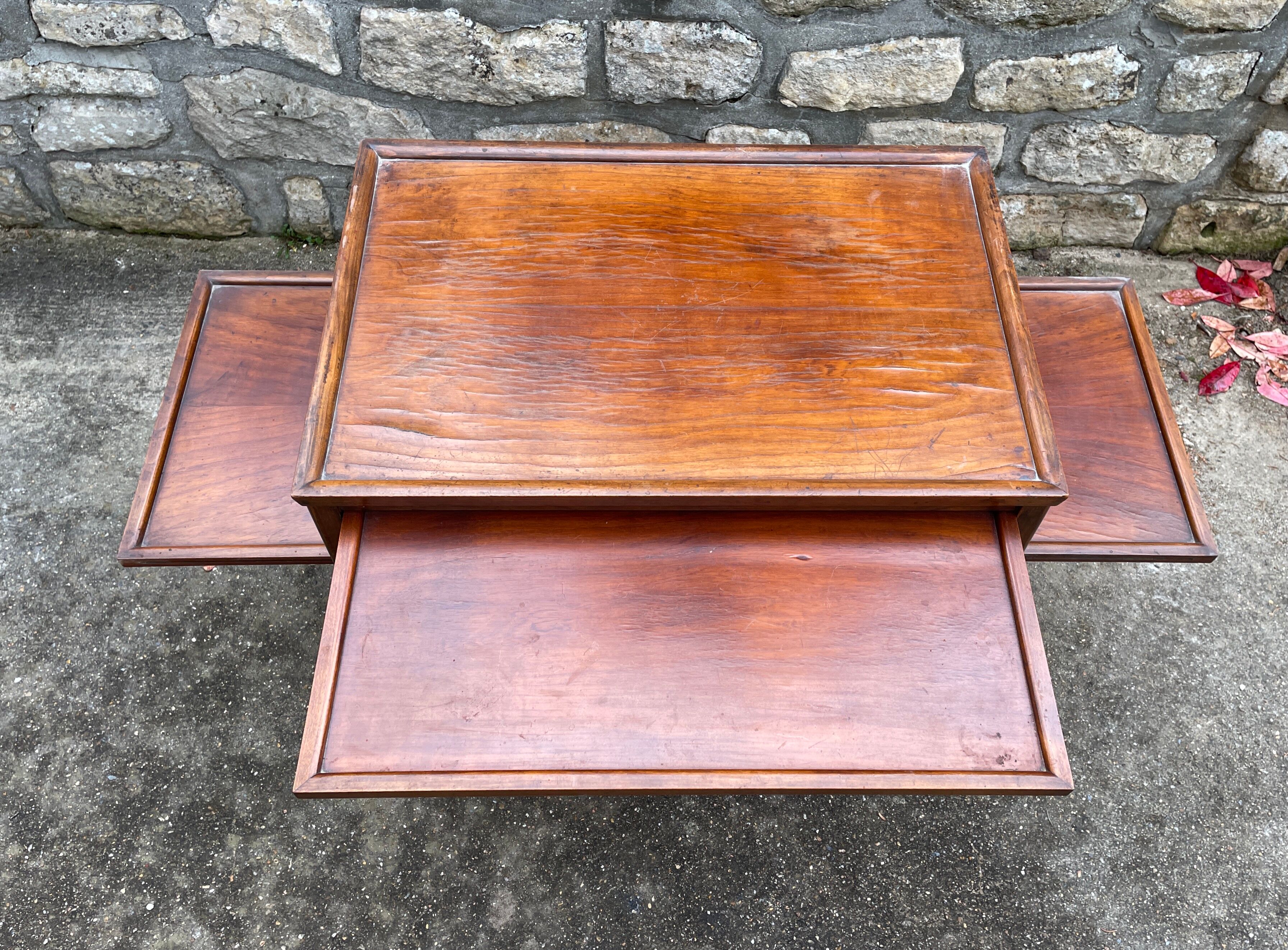Side table / cherry tree service with 3 sliding shelves.