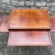 Side table / cherry tree service with 3 sliding shelves.