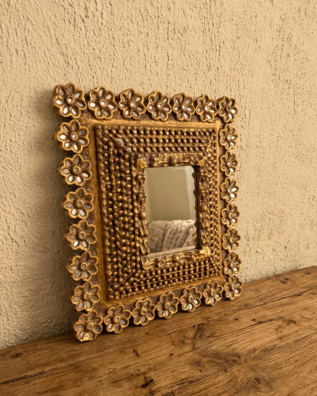 Antique mirror in gilded wood