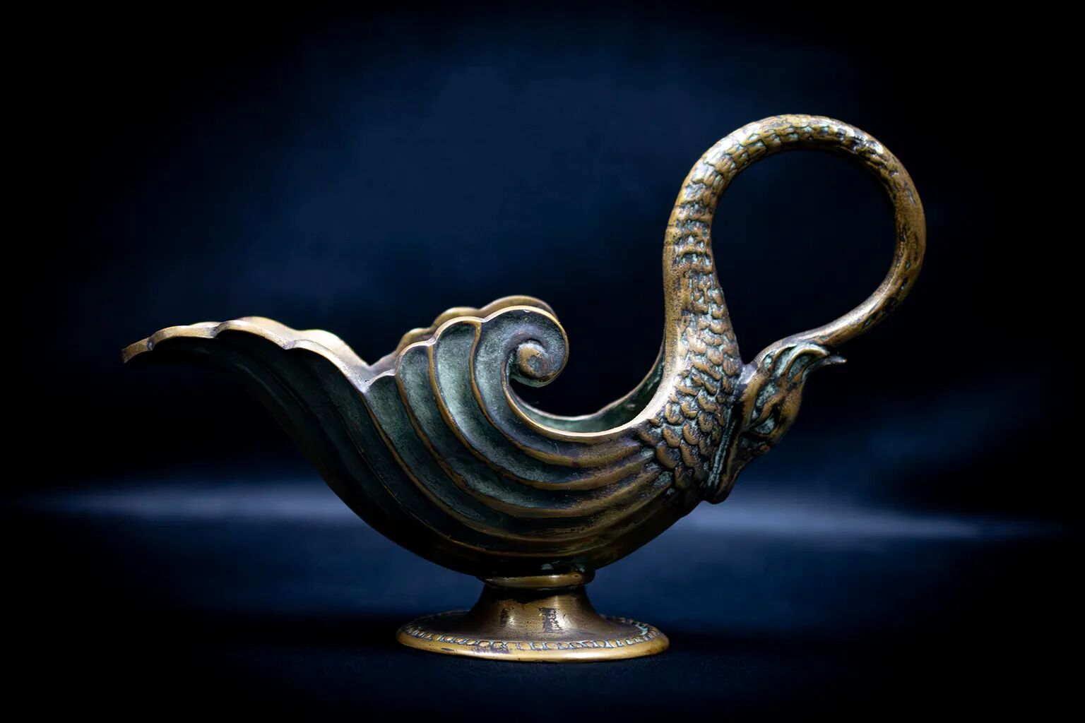 Bronze patinated pocket emptier with swan decoration by Max Le Verrier.