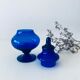 Blue glass apothecary shaped bottle