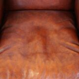 Large comfortable sheepleather wingchair in good condition and beautiful colours