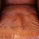 Large comfortable sheepleather wingchair in good condition and beautiful colours