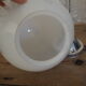 Art Deco suspension globe in white opaline with an aluminium stem.