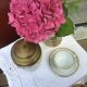 Glass cookie jar engraved metal frame brass