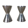 Pair of aluminum diabolo candlesticks