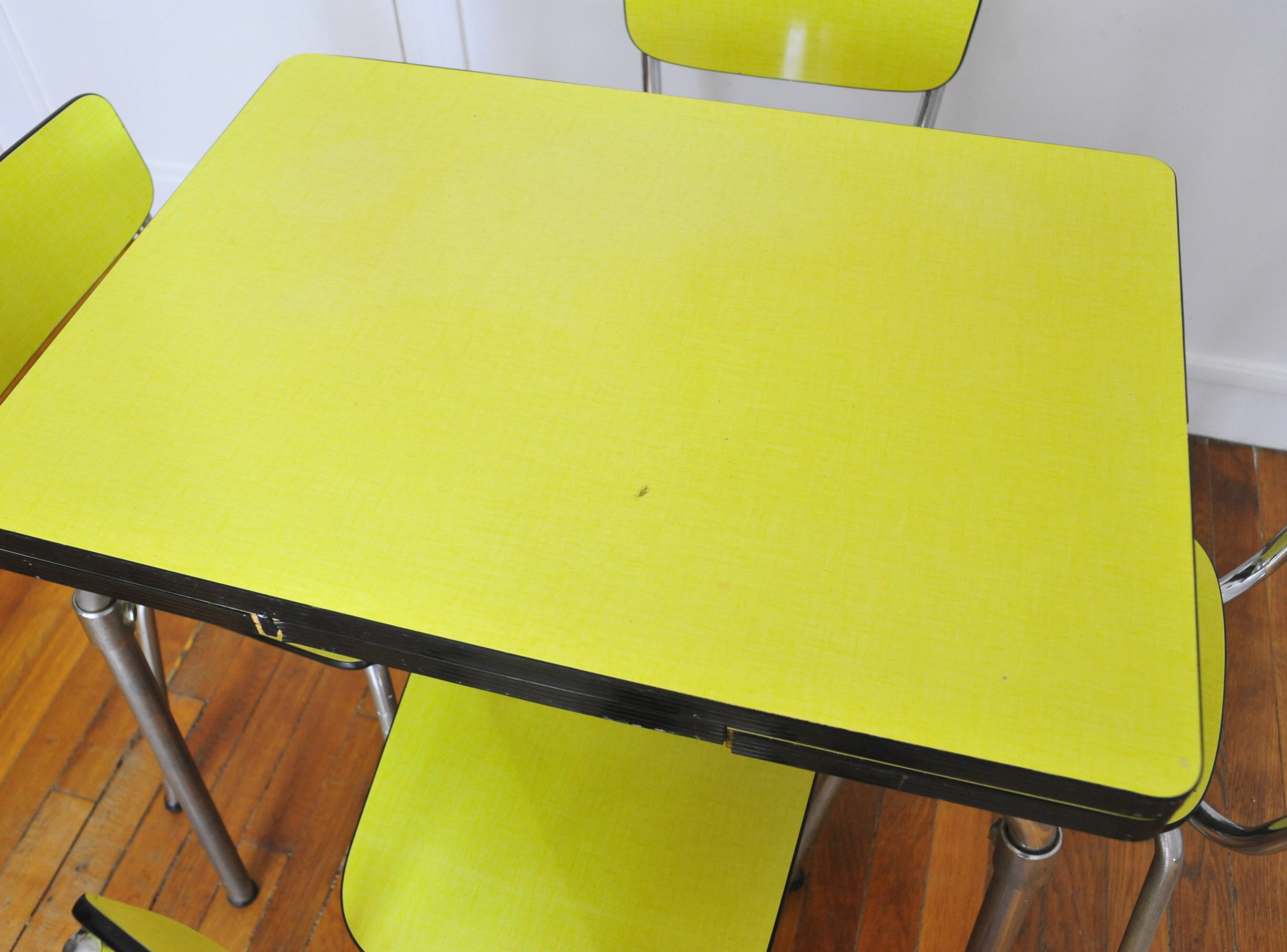Formica table with 4 chairs and a stool dating from the 60s and 70s