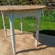 Antique patinated round table – wooden top