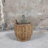 Demijohn with her basket