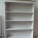 Bookcase in pearl grey waxed finish, light oak waxed top.