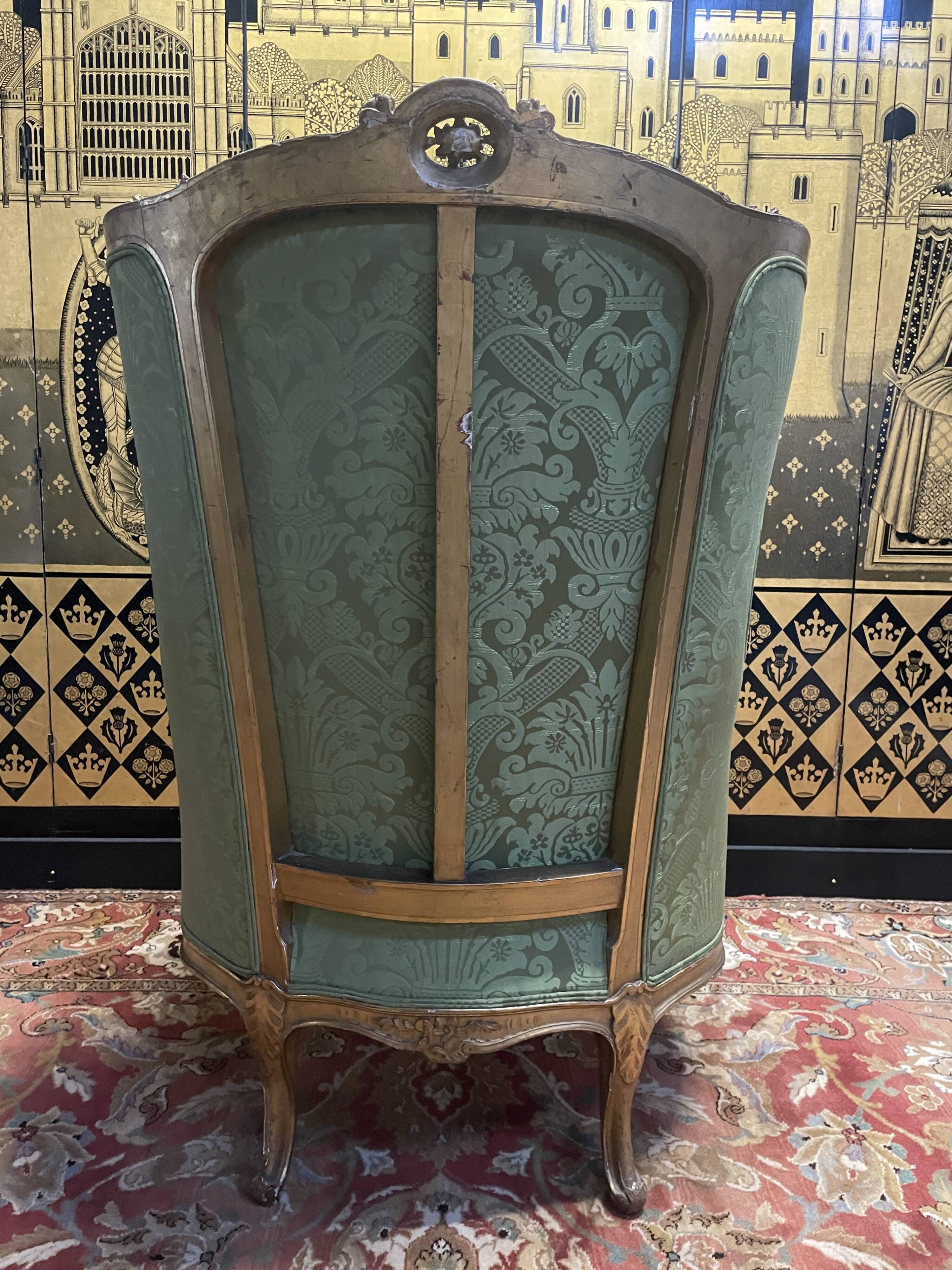 Louis XV golden eared armchair