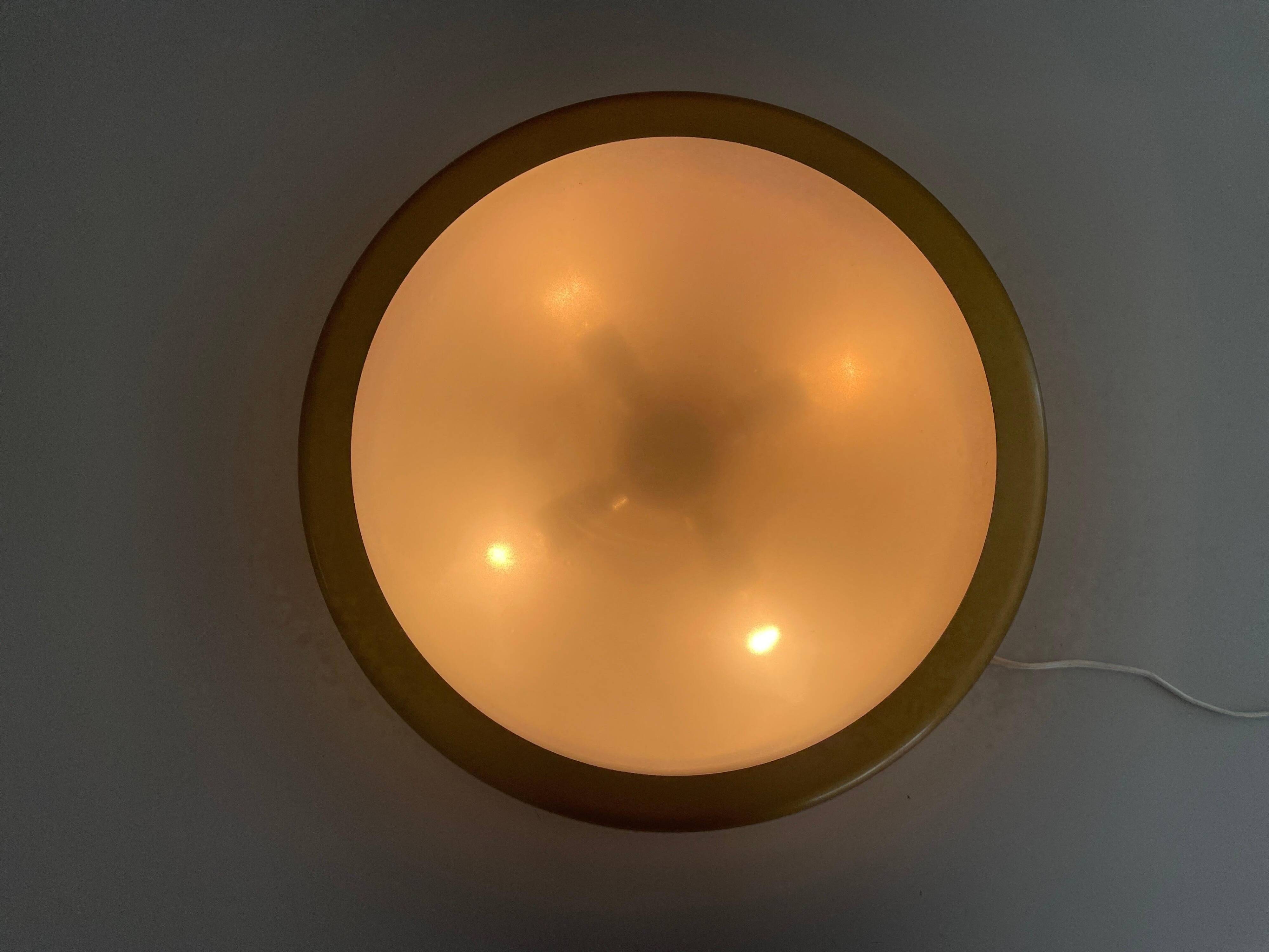 Design/One, flush lamp in glass, gold and brown metal, 1960s, Germany