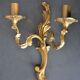 Wall lamp in twisted golden bronze baroque 2 lights