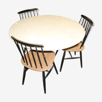 Table ronde en marbre et ses chaises