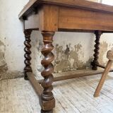 Paneled walnut desk with turned legs, 1900