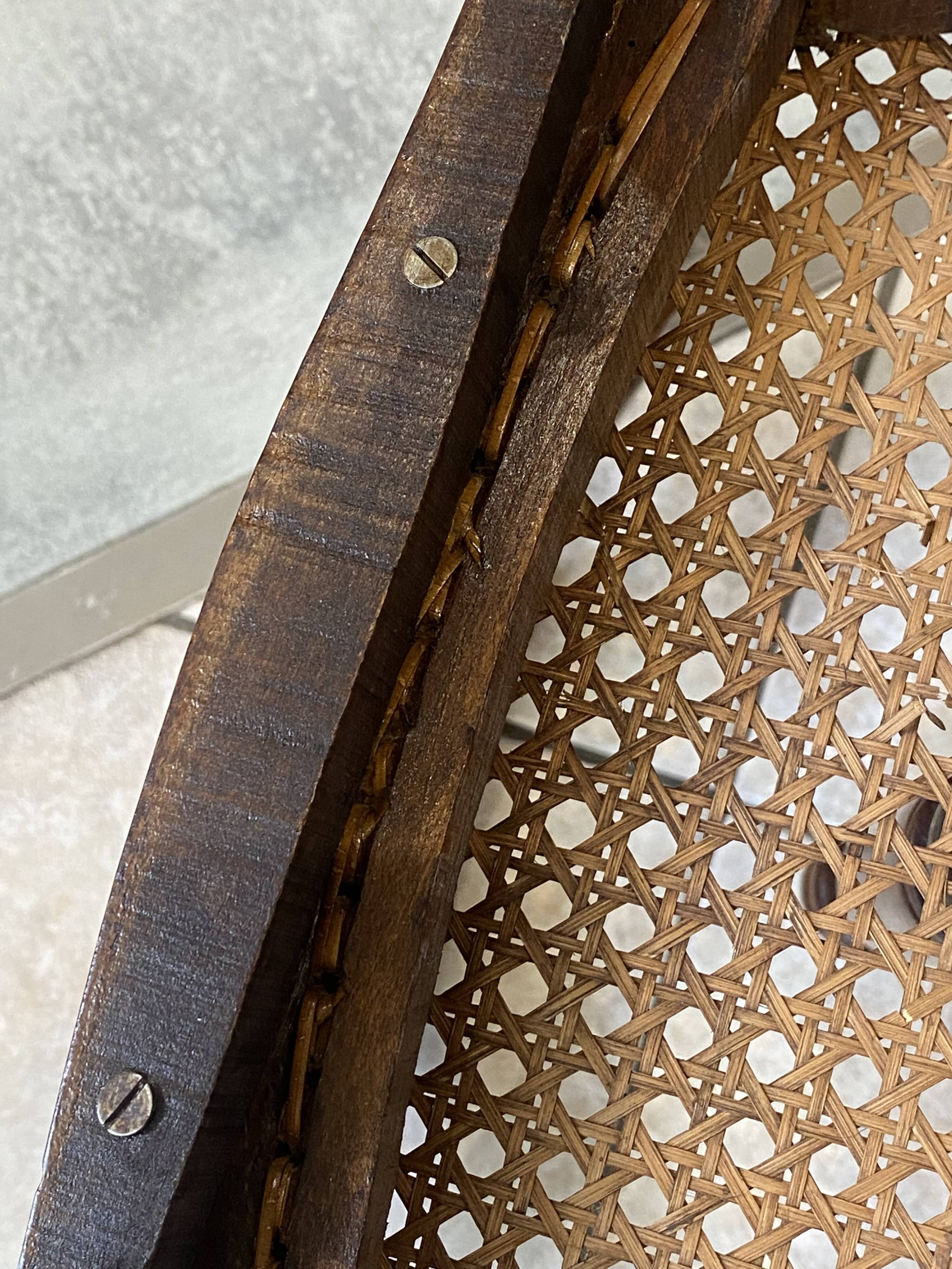 Pair of N2 antique caned and wooden chairs from the 1900s.