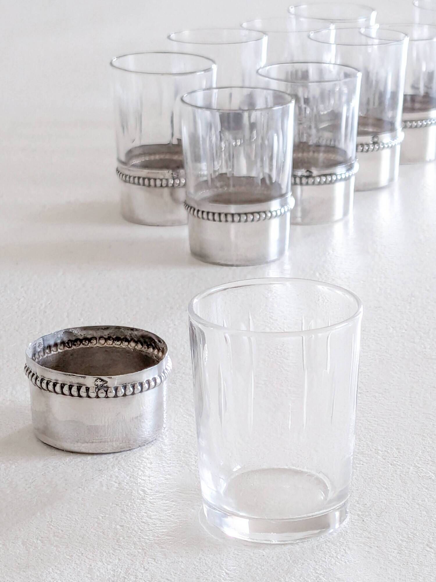 Liqueur service with 10 crystal glasses, solid silver and tray.