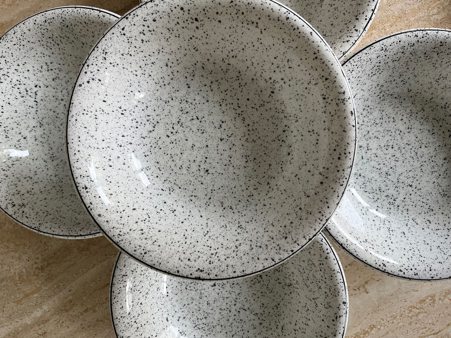 5 hollow plates in hand-speckled Italian ceramic