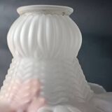 Brass and frosted glass wall lights