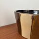 Vintage cache-pot in glazed ceramic, brown and beige geometric pattern.