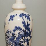 Ceramic lamp with Asian decoration with matching lampshade.