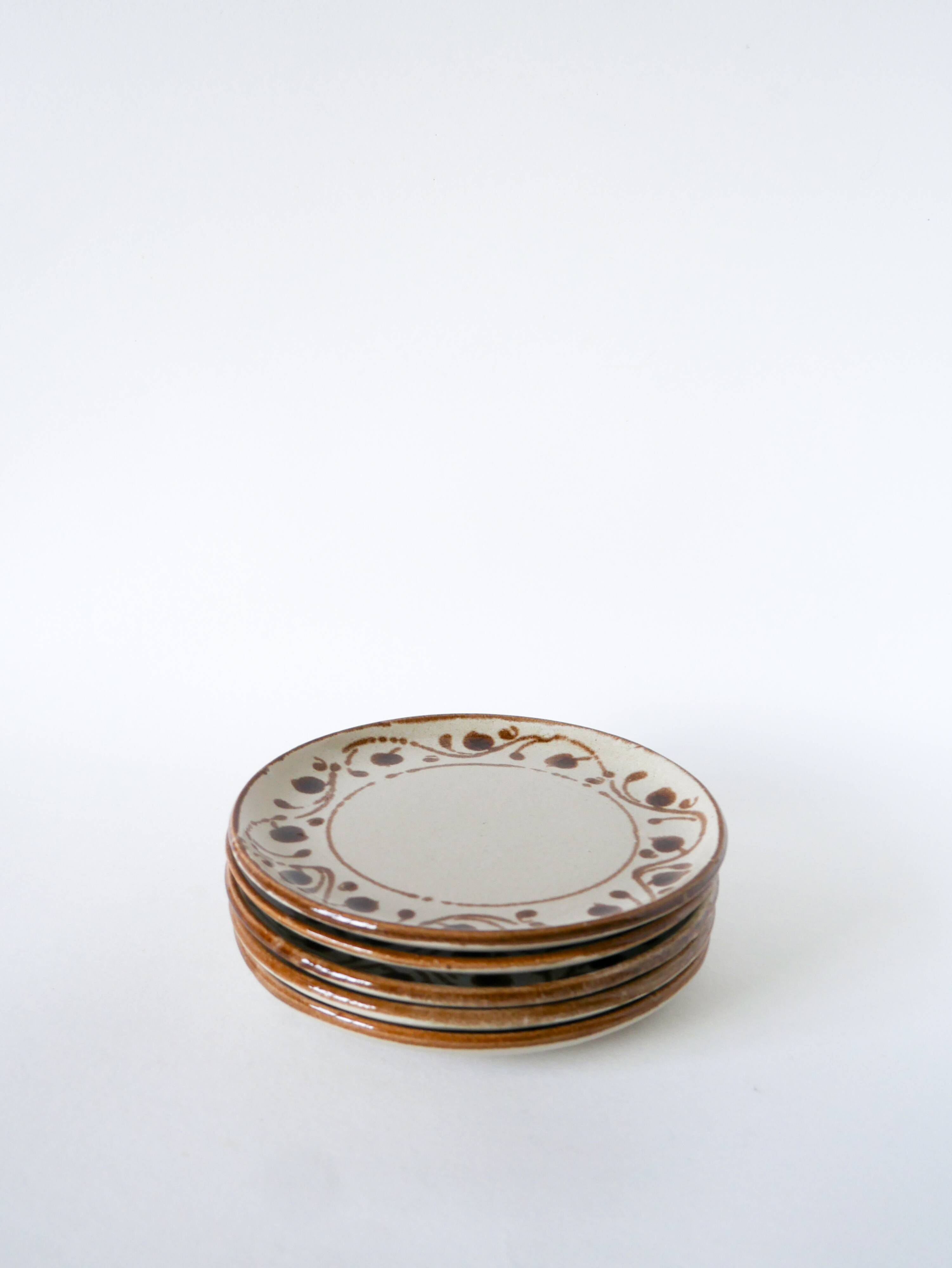 Set of 5 stoneware dessert plates with patterns, 1970.