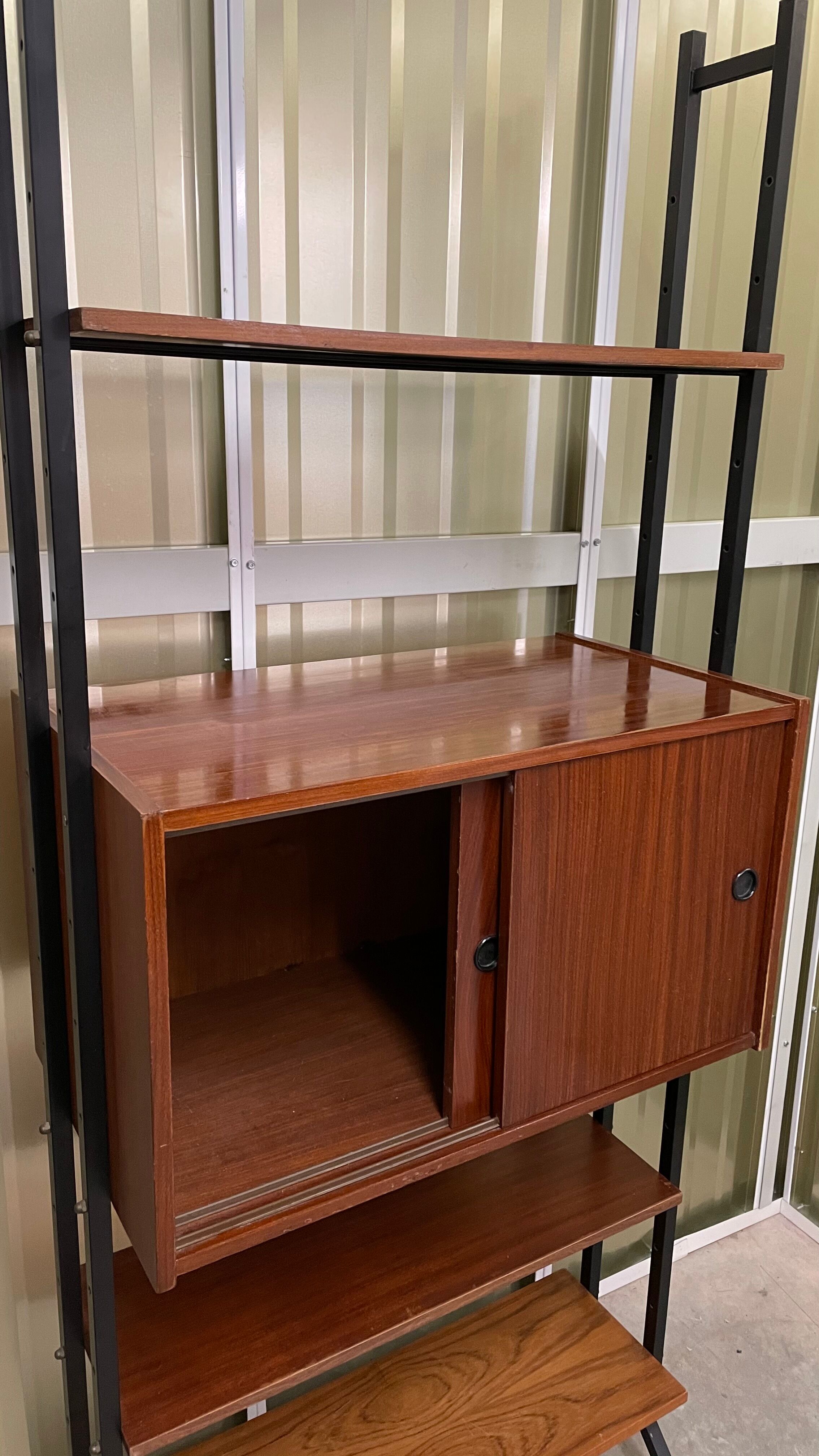 Italian footcase bookcase from the 60s in teak and metal
