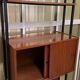 Italian footcase bookcase from the 60s in teak and metal