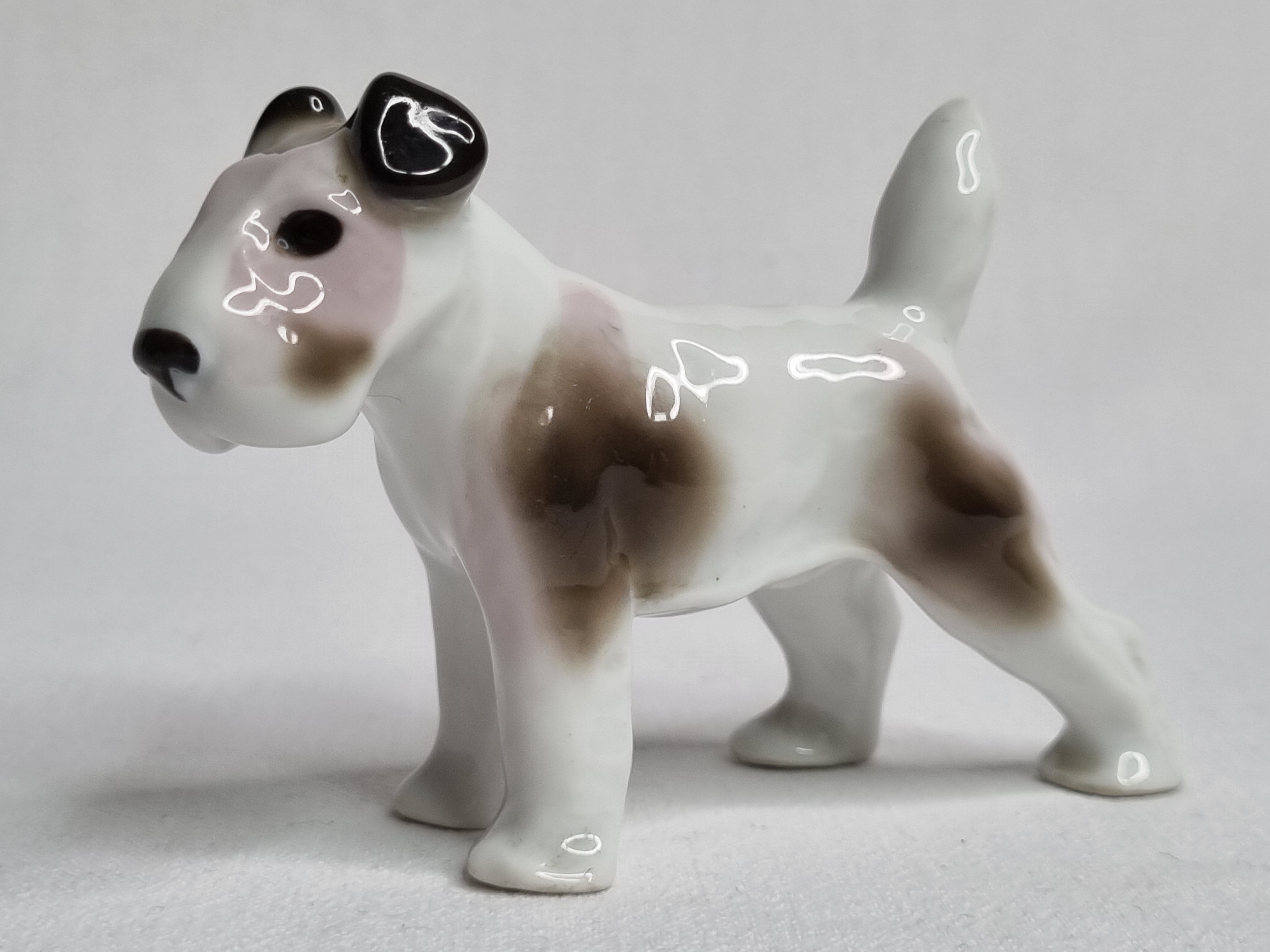 Set of three porcelain puppies
